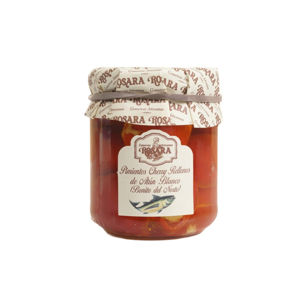 Jar of Rosara jam with a white label on a white background