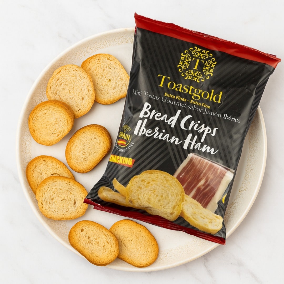 Toastgold Bread Crisps Iberian Ham package with crackers on a plate