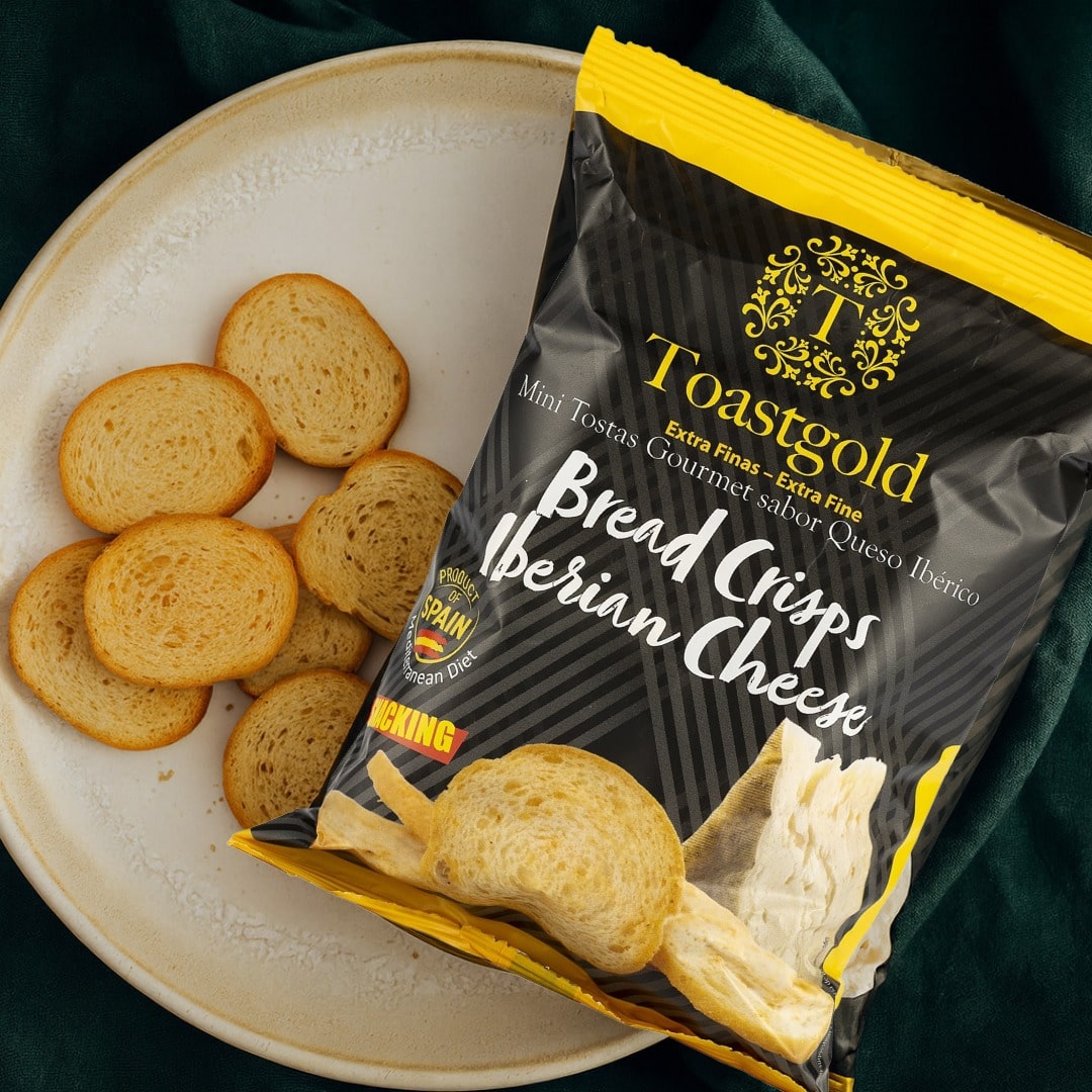 Toastgold Bread Crisps Iberian Cheese package with crackers on a plate