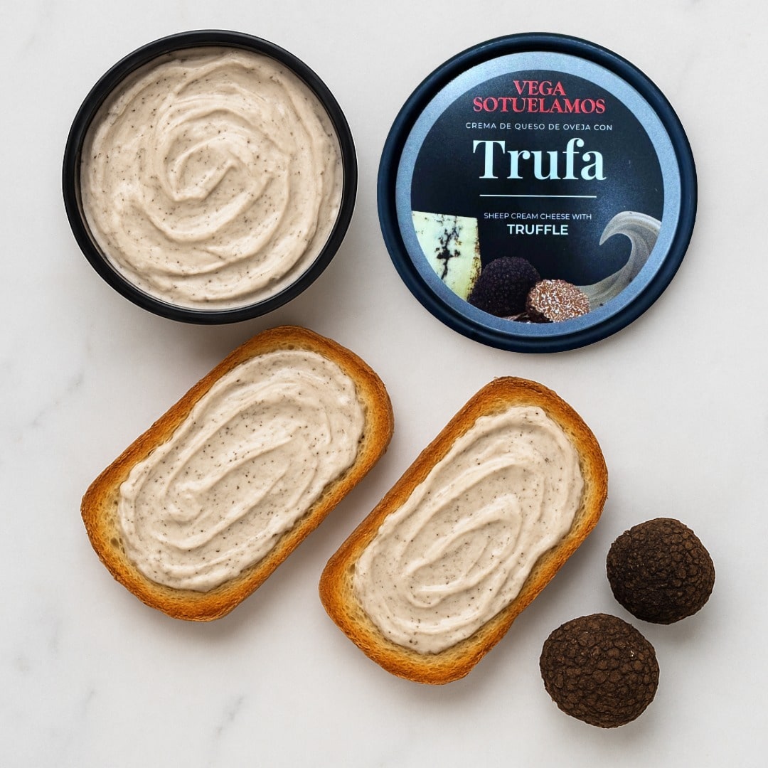 Vega Sotuelamos Trufa cheese spread on bread with a container of the product.